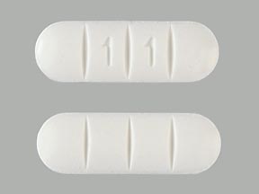 Pill 1 1 White Capsule/Oblong is Alprazolam