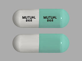 Pill MUTUAL 868 MUTUAL 868 Green & White Capsule/Oblong is Temazepam