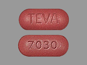 Pill TEVA 7030 Brown Capsule/Oblong is Amlodipine Besylate and Olmesartan Medoxomil