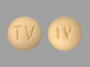Pill TV 1V Beige Round is Vardenafil Hydrochloride