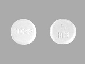 Pill 1023 5 mg White Round is Amlodipine Besylate