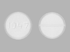 Pill 1047 White Round is Lamotrigine