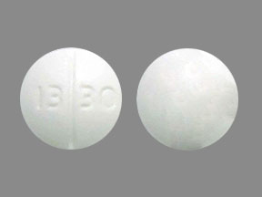 Pill 13 30 White Round is Trazodone Hydrochloride