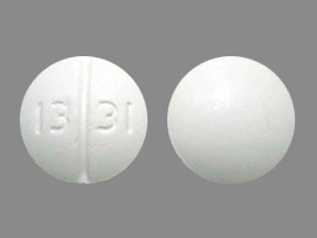 Pill 13 31 White Round is Trazodone Hydrochloride