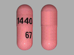 Pill 1440 67 Pink Capsule-shape is Fenofibrate (Micronized)