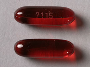 Pill 7115 Red Capsule/Oblong is Docusate Calcium