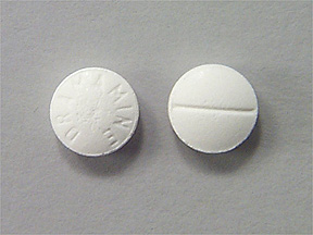 Pill DRAMAMINE White Round is Dramamine Original Formula