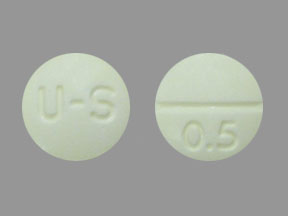 Pill U-S 0.5 Yellow Round is Clonazepam