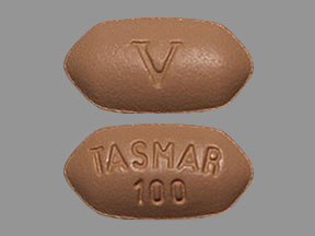 Pill V TASMAR 100 Tan Six-sided is Tolcapone