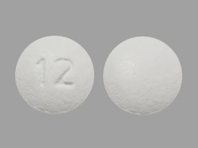 Pill 12 White Round is Olanzapine