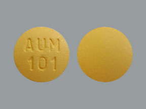 Pill AUM 101 Beige Round is Montelukast Sodium