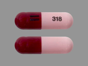 Pill Logo 318 Maroon & Pink Capsule/Oblong is Minocycline Hydrochloride