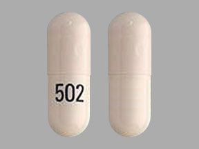Pill 502 White Capsule/Oblong is Omeprazole and Sodium Bicarbonate