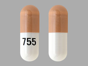 Pill 755 Orange & White Capsule/Oblong is Temozolomide