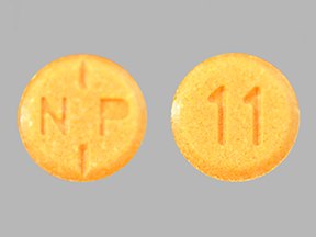 Pill N P 11 Orange Round is Oxycodone Hydrochloride