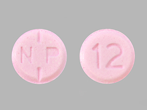 Pill N P 12 Pink Round is Oxycodone Hydrochloride