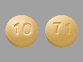 Pill 10 71 Orange Round is Vardenafil Hydrochloride