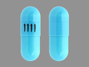 Pill 1111 Blue Capsule/Oblong is Tizanidine Hydrochloride