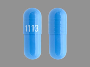 Pill 1113 Purple Capsule/Oblong is Tizanidine Hydrochloride