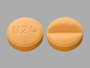 Pill 1124 Orange Round is Doxycycline Monohydrate