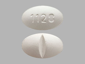 Pill 1128 White Oval is Ursodiol