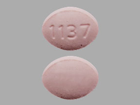 Pill 1137 Pink Oval is Fluconazole