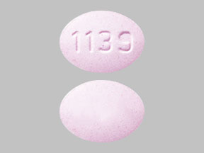 Pill 1139 Pink Oval is Fluconazole