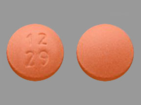 Pill 12 29 Orange Round is Amitriptyline Hydrochloride