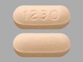 Pill 1230 Beige Capsule/Oblong is Amitriptyline Hydrochloride