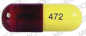 Pill 472 WYETH Red Capsule/Oblong is Basaljel