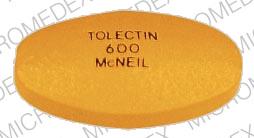 Pill TOLECTIN 600 MCNEIL Orange Oval is Tolectin 600