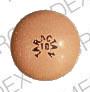 Pill ROCHE TARACTAN 10 Brown Round is Taractan