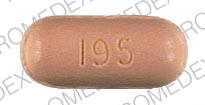 Pill 195 Brown Elliptical/Oval is Diflunisal