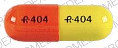 Pill R 404 Orange Capsule/Oblong is Tetracycline