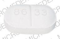 Pill 86 33 White Elliptical/Oval is Theo-X