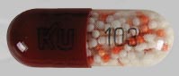 Pill 103 KU Brown Capsule/Oblong is HYOSCYAMINE SULFATE