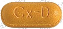 Pill Cx-D Orange Elliptical/Oval is Comtrex non-drowsy