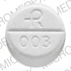 Pill 4 R 003 White Round is Acetaminophen and Codeine Phosphate