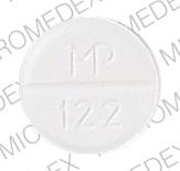 Pill MP 122 White Round is Acetaminophen and Codeine Phosphate