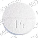 Pill logo 14 is Quadrinal 24 mg / 24 mg / 320 mg / 65 mg