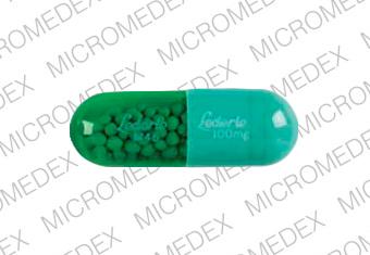 Pill Lederle M46 Lederle 100 mg Green Capsule/Oblong is Minocin