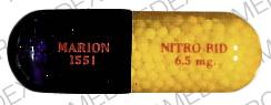 Pill MARION 1551 NITRO-BID 6.5 mg Brown Capsule-shape is Nitro-bid