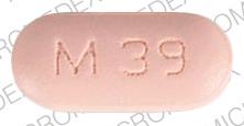 Pill M 39 Pink Capsule-shape is Amitriptyline Hydrochloride