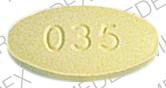 Pill par 035 White & Yellow Elliptical/Oval is Meclizine Hydrochloride
