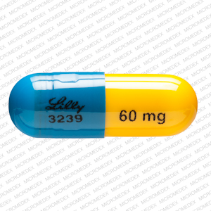 Pill LILLY 3239 60 mg Blue & Yellow Capsule/Oblong is Strattera