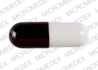 Pill 0115 7024 Brown & White Capsule/Oblong is Lipram-CR20