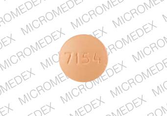 Pill 93 7154 Tan Round is Simvastatin