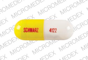 Pill 4122 SCHWARZ White & Yellow Capsule/Oblong is Ku-zyme