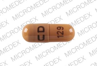 Pill CD 129 Brown Capsule/Oblong is Ranitidine Hydrochloride