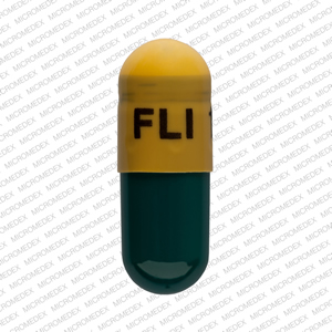 Pill FLI 14 mg Green & Yellow Capsule-shape is Memantine Hydrochloride Extended Release